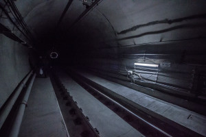 Hong Kong MTR underground, darkness enshrouding the tunnel.