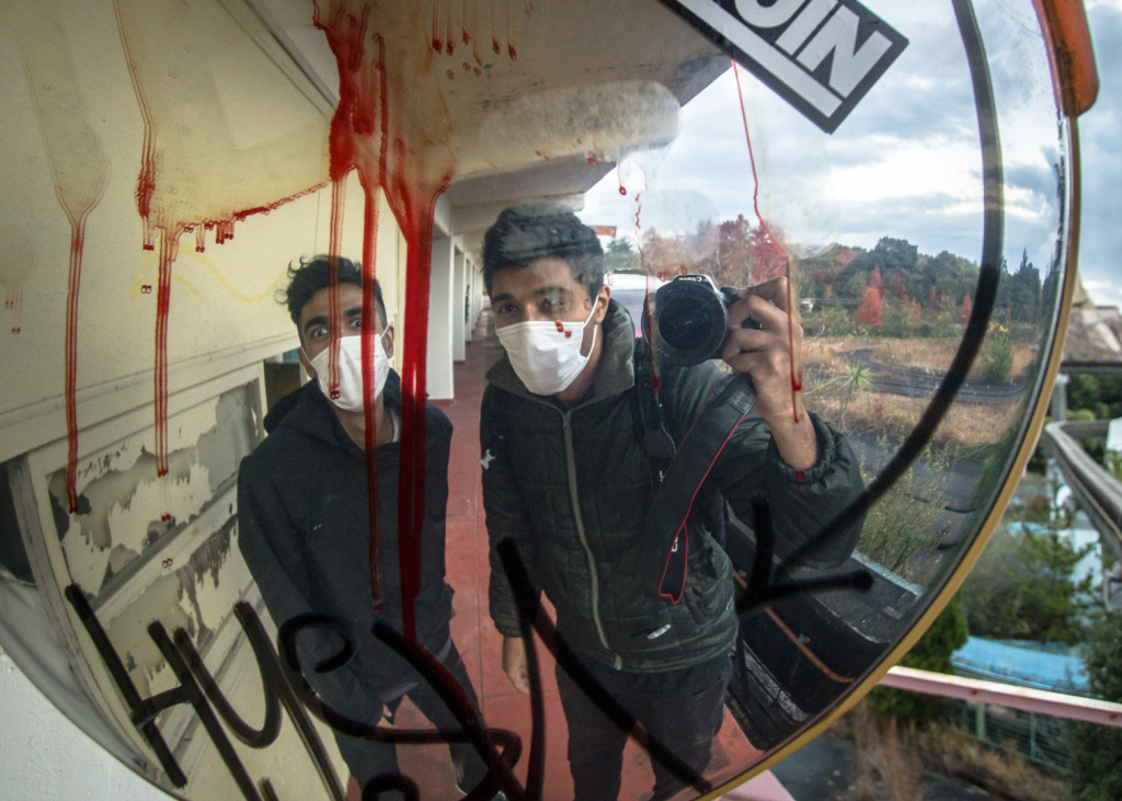 Image of a ride mirror taken while exploring Nara Dreamland in Japan