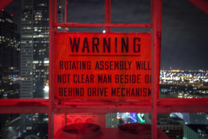 Warning sign at night in Dallas, TX