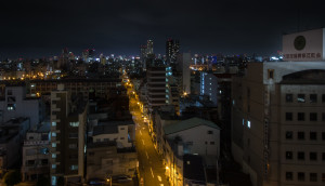 Street view at Nishinari, taken while rooftopping in Osaka, Japan at night