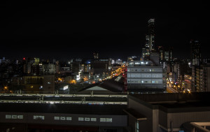 Image at night of Shinimamiya station, taken while rooftopping