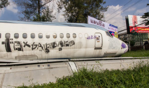 An abandoned MD80 in a field in Bangkok, Thailand