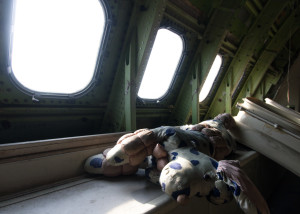A stuffed animal inside an abandoned Boeing 747 jumbo jet in Bangkok, Thailand
